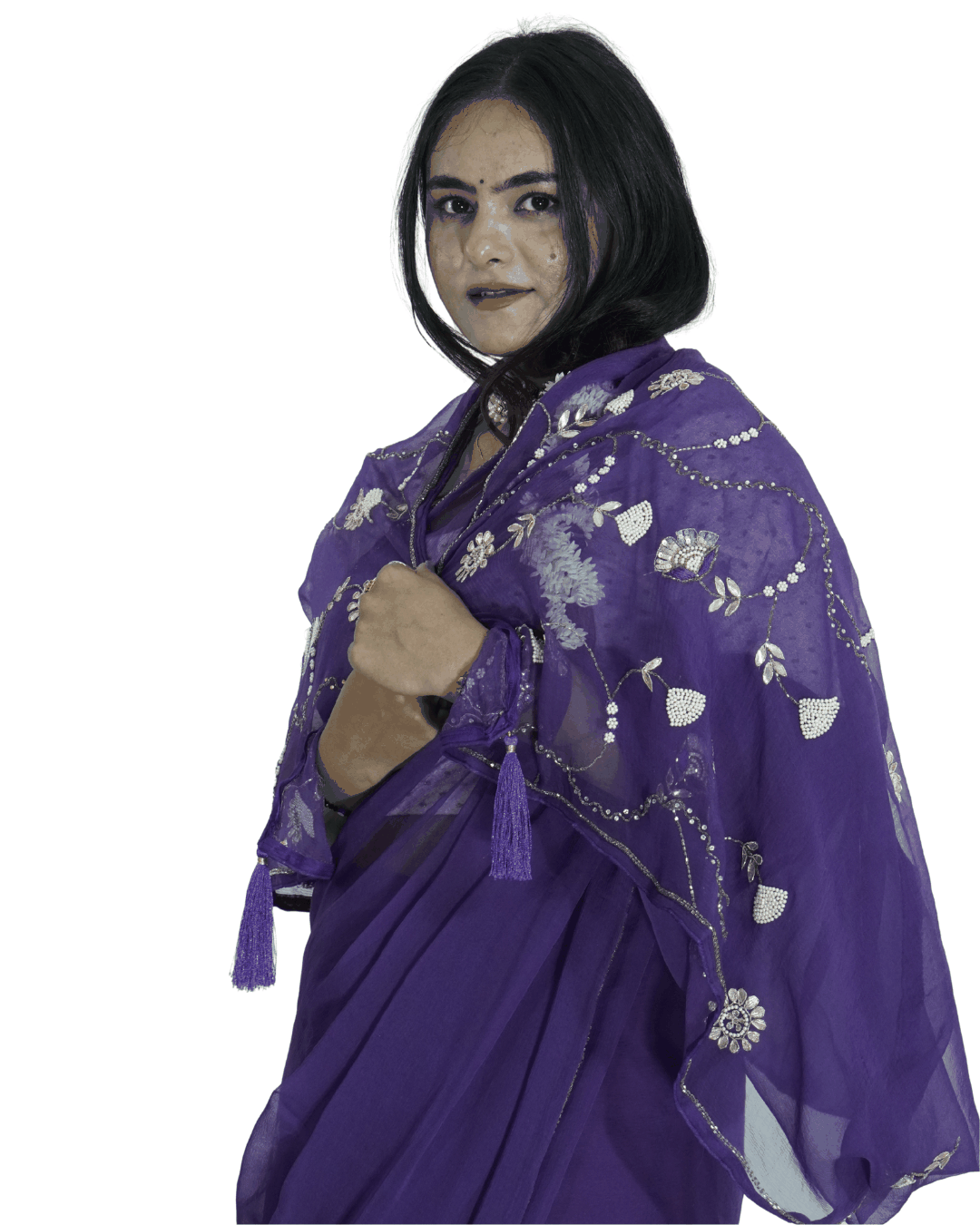 Portrait of a woman draped in a deep purple handcrafted saree with intricate floral embroidery and tassel detailing, showcasing Amai Jaipur’s sustainable luxury ethnic wear and traditional Jaipur craftsmanship.