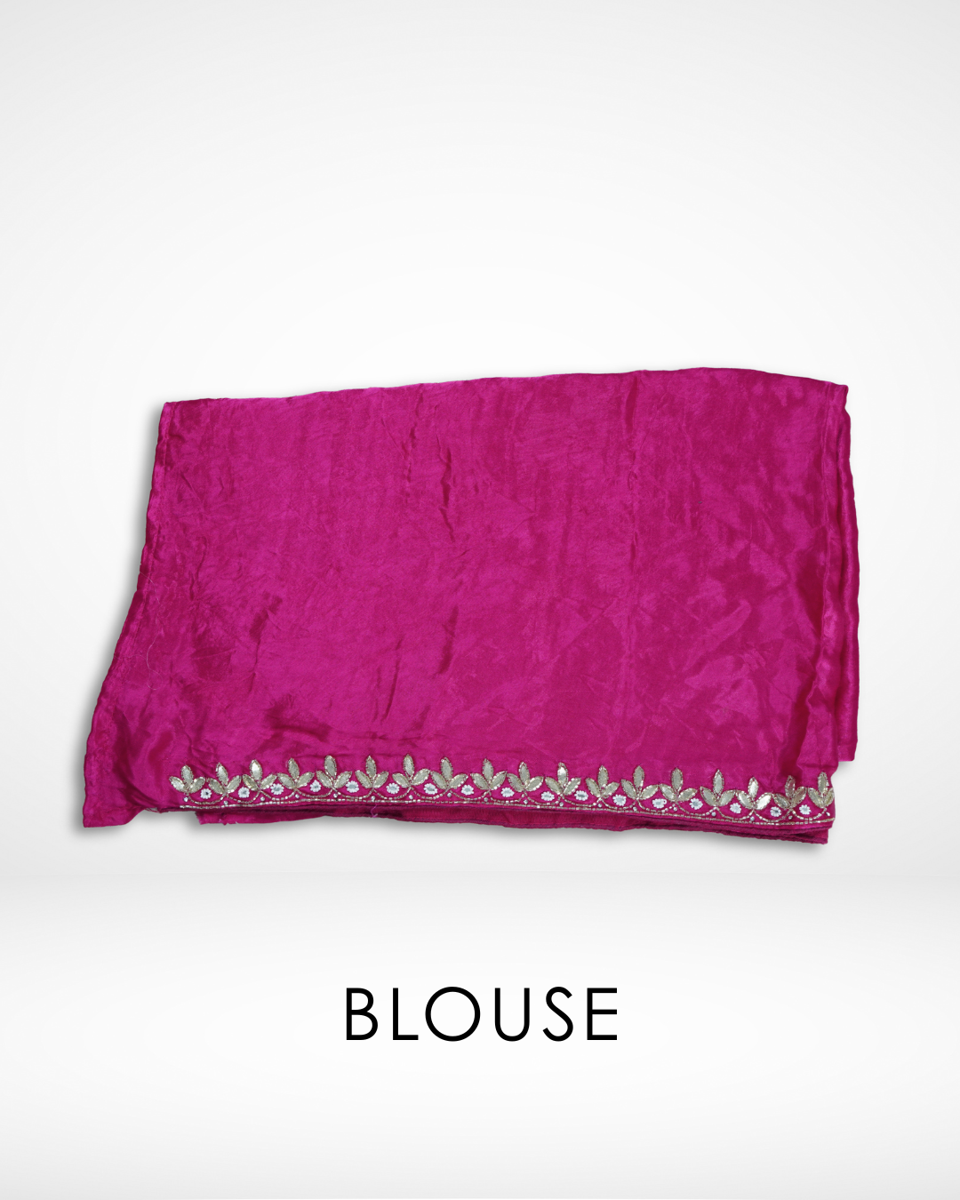 Pink silk blouse fabric with delicate gold floral embroidery border, designed to complement Amai Jaipur’s handcrafted luxury saree collection inspired by traditional Jaipur craftsmanship and sustainable ethnic fashion.