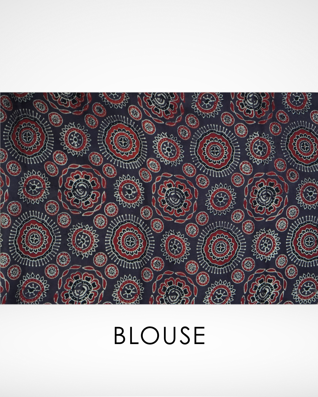 Ajrakh print blouse fabric with intricate circular and floral motifs in deep indigo, red, and white, designed to complement Amai Jaipur’s handcrafted sustainable luxury saree collection inspired by traditional Jaipur textile artistry.