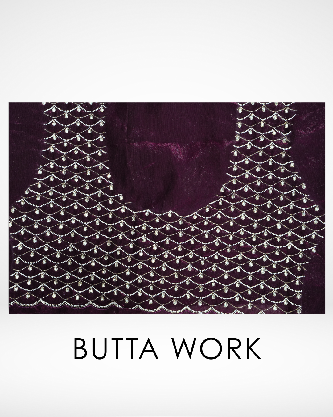 Close-up of deep wine-purple blouse fabric featuring intricate silver butta embroidery arranged in cascading scalloped patterns, creating a rich and elegant decorative design. ✨