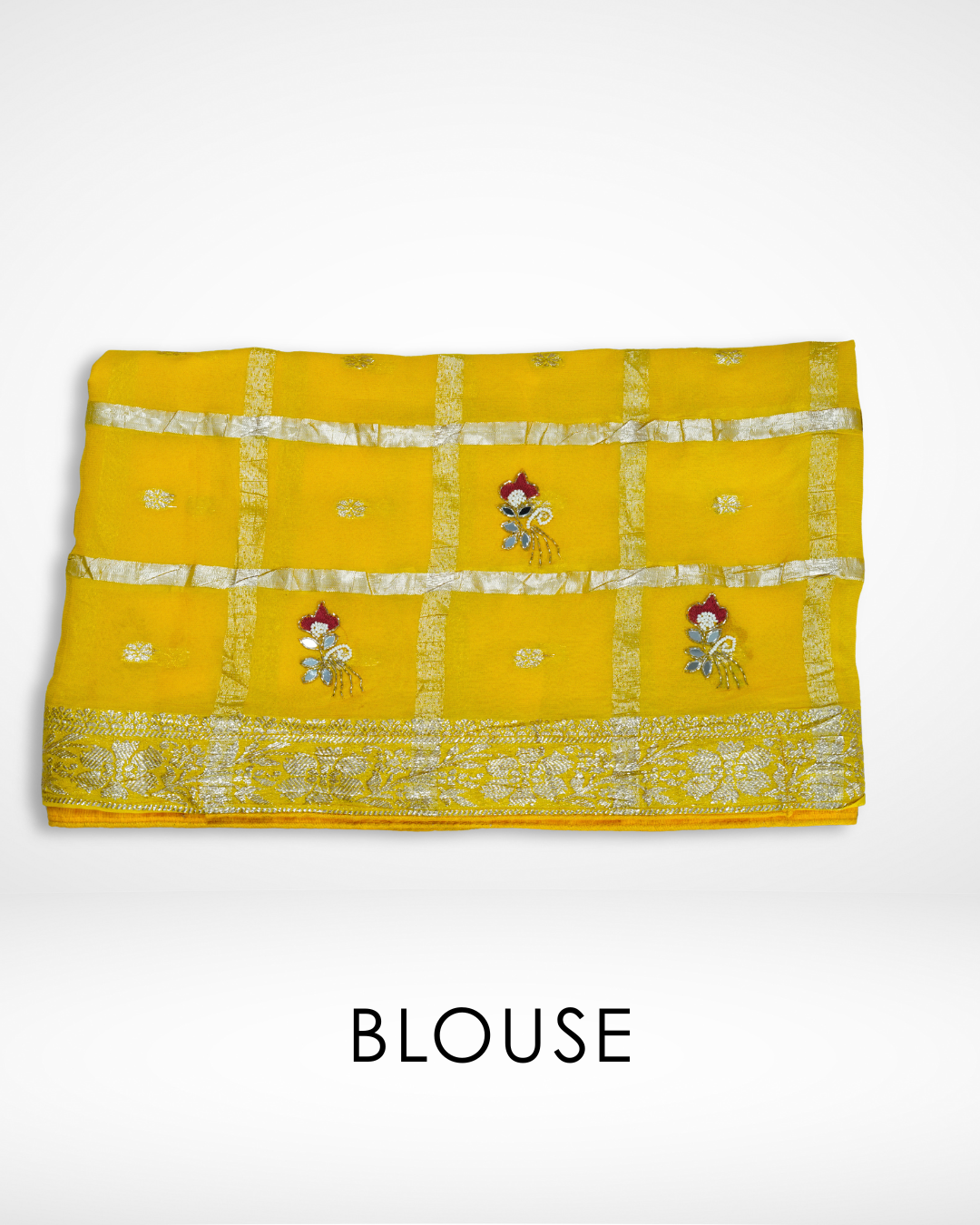 Yellow blouse fabric designed to pair with a saree, featuring a gold zari checkered pattern, delicate buti motifs, and embroidered floral accents along the border for a vibrant festive look. ✨