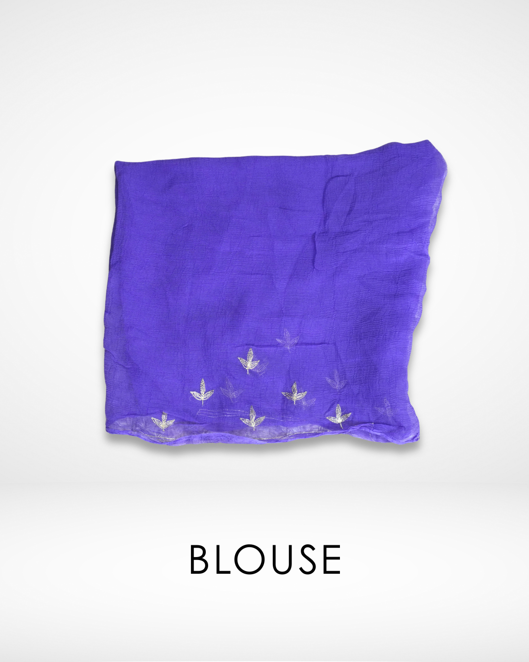 Purple blouse fabric with delicate silver leaf embroidery along the edge, designed to pair with a multicolor saree for a coordinated traditional look. ✨