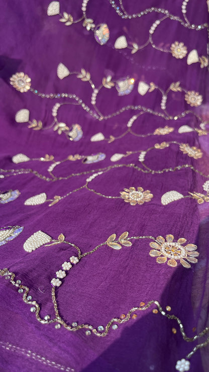 Lightweight Pure Chiffon Saree with rich Kardhana and Gotta Patti embroidery; the pallu showcases a heavy floral handwork design and is embellished with tassels. Close Up Motifs.