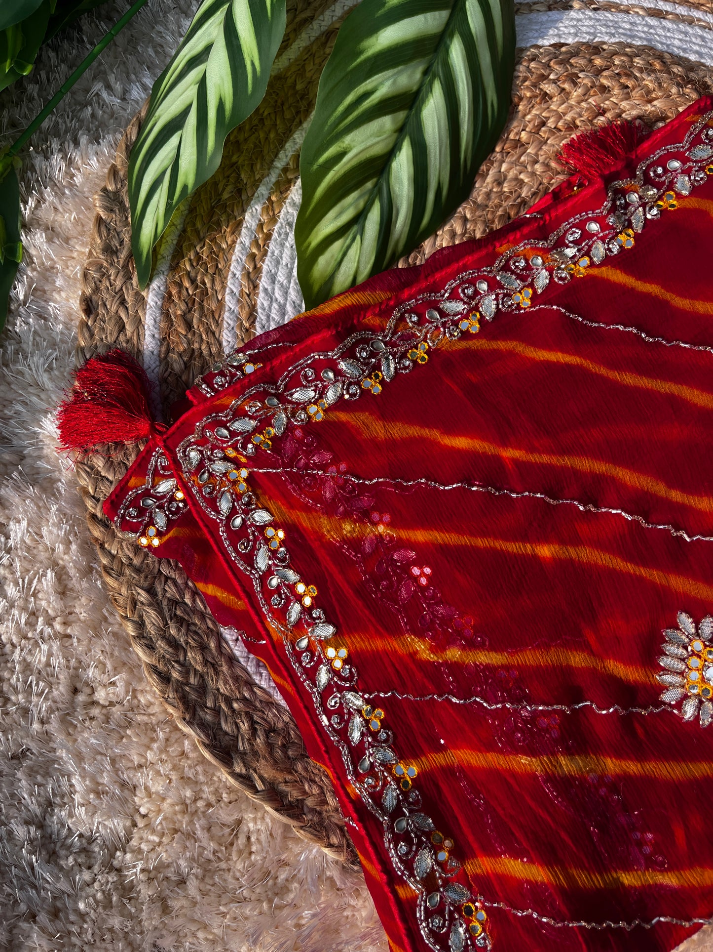 Vibrant Red Lehariya Pure Chiffon Saree featuring Heavy Kardhana and Gotta Patti Butta Work. Traditional Rajasthani handwork for wedding and festive wear.
