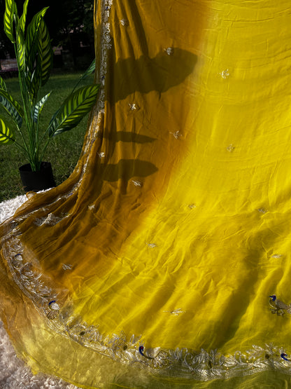 Lightweight Pure Chiffon Saree hand-embroidered with traditional Aari Tari and sparkling Peacock Butta motifs, ideal for wedding wear. This is a Picture of Pallu