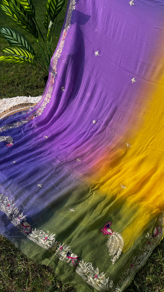 Lightweight Pastel Lavender, Saucy Yellow, and Olive Green Pure Chiffon Saree, hand-embroidered with traditional Aari Tari and sparkling Peacock Aari Butta motifs. This is a picture of Pallu.