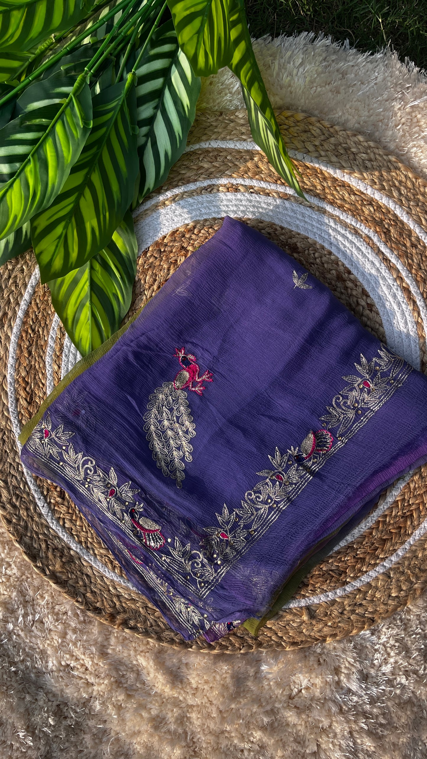 Lightweight Pastel Lavender, Saucy Yellow, and Olive Green Pure Chiffon Saree, hand-embroidered with traditional Aari Tari and sparkling Peacock Aari Butta motifs. This Picture Showcases Saree when it is Folded Properly.
