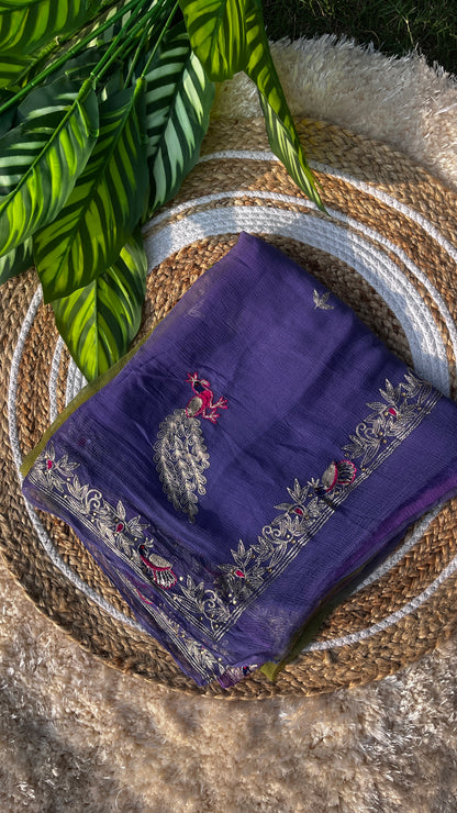 Lightweight Pastel Lavender, Saucy Yellow, and Olive Green Pure Chiffon Saree, hand-embroidered with traditional Aari Tari and sparkling Peacock Aari Butta motifs. This Picture Showcases Saree when it is Folded Properly.