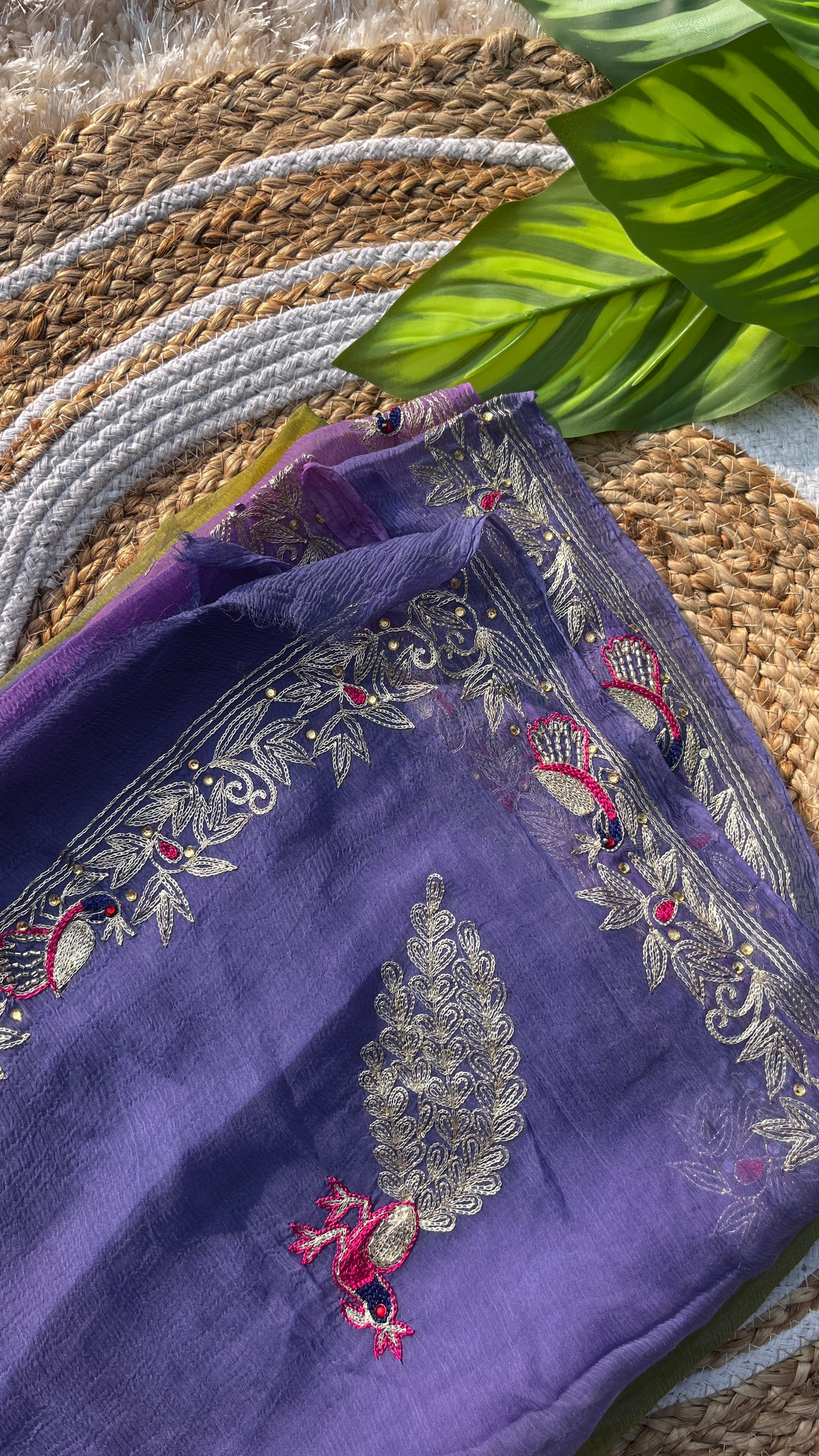 Lightweight Pastel Lavender, Saucy Yellow, and Olive Green Pure Chiffon Saree, hand-embroidered with traditional Aari Tari and sparkling Peacock Aari Butta motifs.